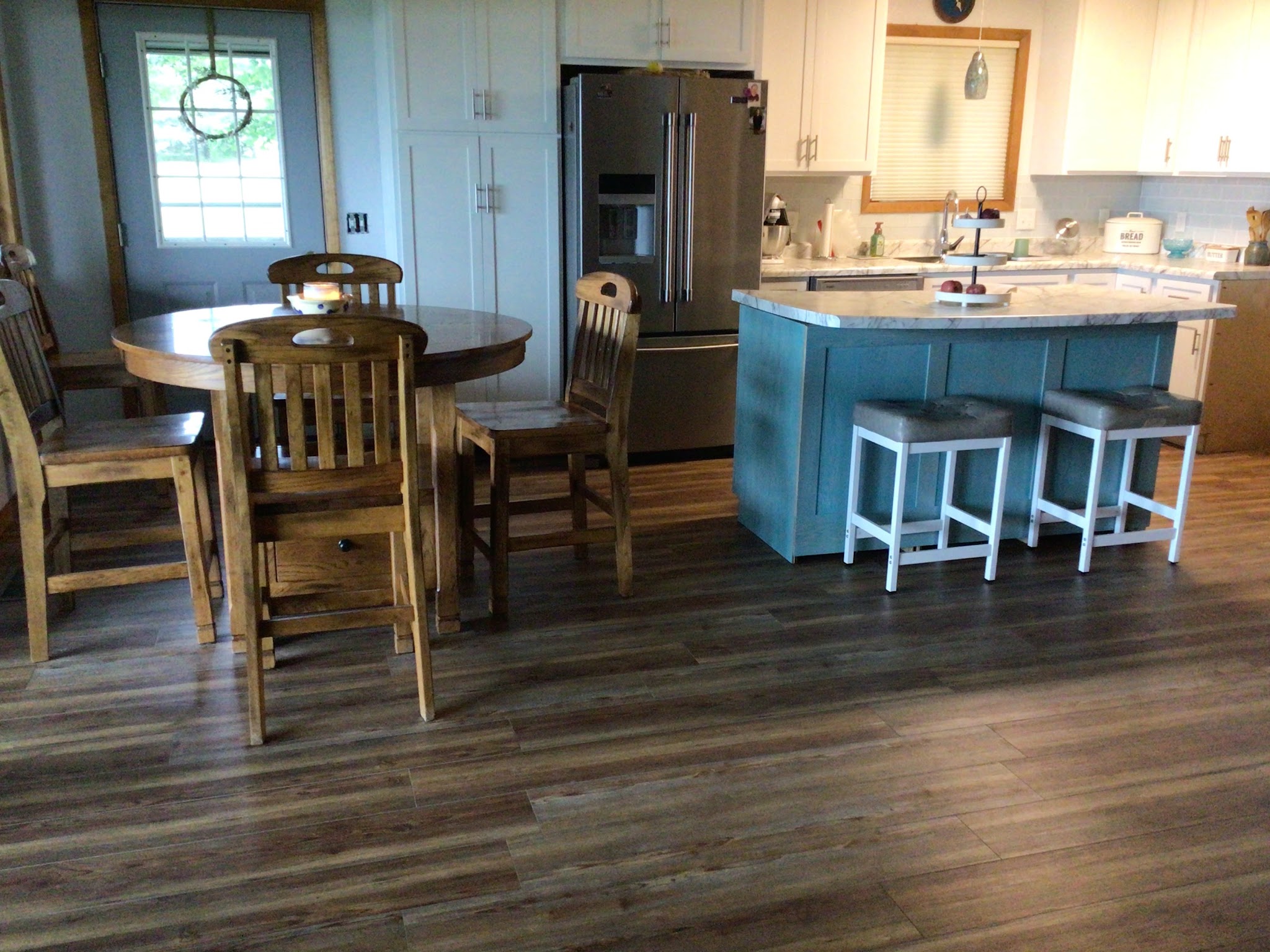 Kitchen island and plank floor